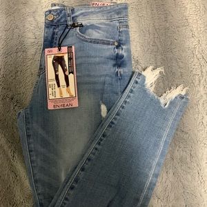 High rise light wash distressed skinny jeans